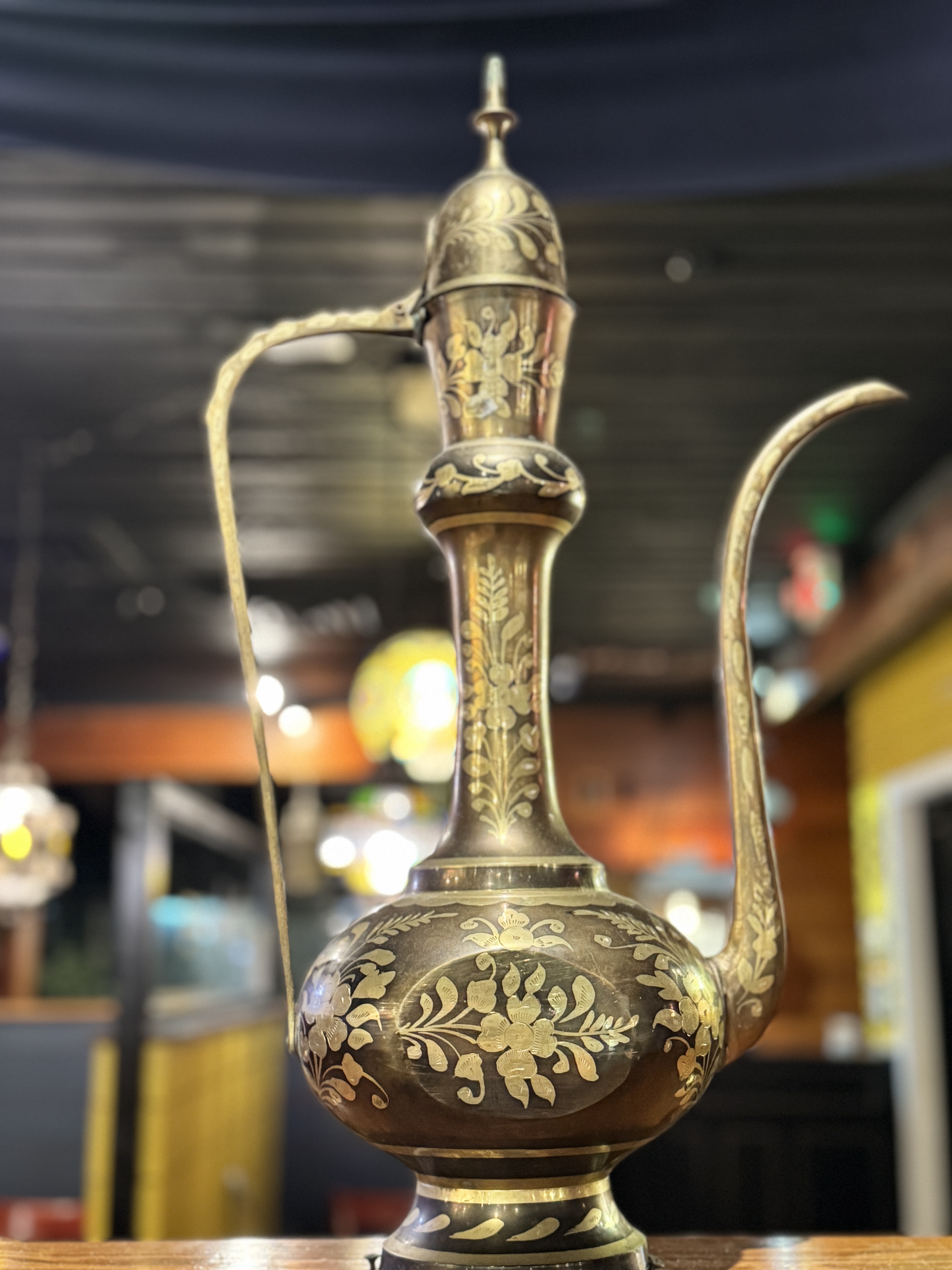 Traditional engraved brass dalla at Marrakesh